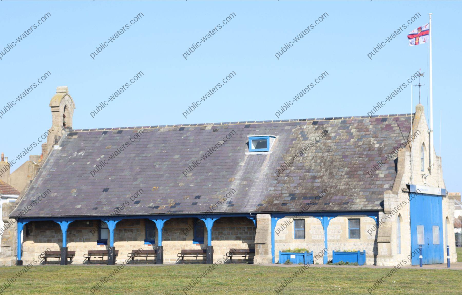 Walmer Lifeboat Station side view and bench seating area with shelter